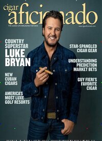 Titelbild der Ausgabe 4/2026 von Cigar Aficionado. Diese Zeitschrift und viele weitere Wirtschaftsmagazine und Politikmagazine als Abo oder epaper bei United Kiosk online kaufen.